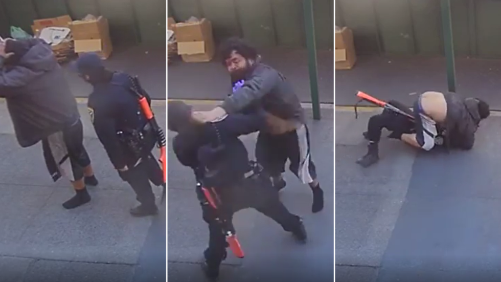 شاهد مشرد أمريكي يعتدي على شرطية أثناء تفتيشه ويسقطها أرضاً