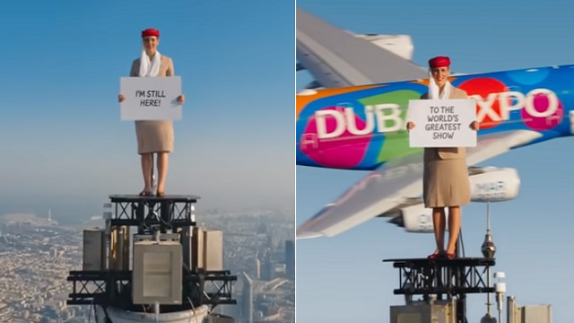 شاهد إعلان يحبس الأنفاس لمضيفة طيران الإمارات تقف على قمة برج خليفة وتحلق طائرة ضخمة خلفها